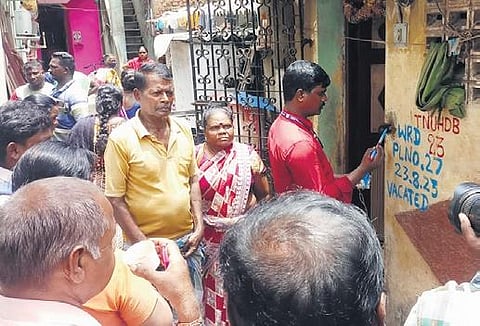 The families were originally allotted land under the MUDP slum improvement scheme. It has been cancelled and they were allotted houses | special arrangement
