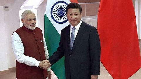 FILE - Prime Minister Narendra Modi shakes hands with Chinese President Xi Jinping (Photo | PTI)