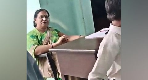 A screen grab of the video in which the teacher, Tripta Tyagi, was caught asked her students to slap their Muslim classmate.