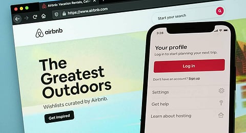The login page for Airbnb's iPhone app is displayed on a computer displaying Airbnb's website. (Photo | AP)