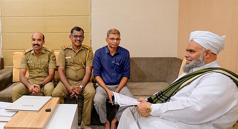 MVD officials meeting Ibraheem Khaleel Al Bukhari at Madin. (Photo | Express)