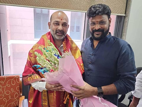 Casino organiser Chikoti Praveen with BJP general secretary and Karimnagar MP Bandi Sanjay. (Photo | Express)
