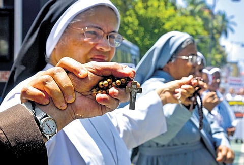Priests and nuns under Ernakulam-Angamaly archdiocese forming a human chain from Vanchi Square to Menaka Junction in Kochi to express solidarity with the people of Manipur. (Photo | A Sanesh)