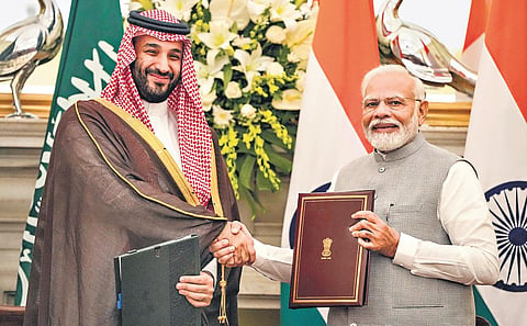 Saudi crown Prince Mohammed bin Salman and Prime Minister Narendra Modi shake hands after signing the minutes of their meeting, in New Delhi on Monday. (Photo | PTI)