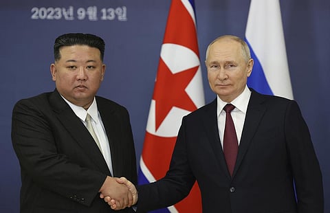 Russian President Vladimir Putin (R) with North Korea's leader Kim Jong Un during their meeting at the Vostochny cosmodrome in Russia's far eastern Amur region, Sept. 13, 2023. (Photo | AP)