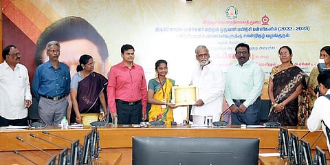 C Ramya receiving the archaka course completiion certificate from HR&CE Minister PK Sekarbabu in Chennai | Express