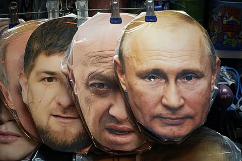 FILE - Face masks depicting Vladimir Putin, Yevgeny Prigozhin and Ramzan Kadyrov displayed among others for sale at a souvenir shop in St Petersburg, Russia, June 4, 2023. (Photo | AP)