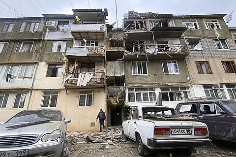 A damaged residential apartment building following shelling is seen in Stepanakert, Nagorno-Karabakh. (Photo | AP)