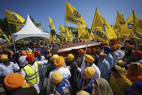 FILE - Mourners carry the casket of Hardeep Singh Nijjar during Antim Darshan, the first part of a day-long funeral service for him, in Surrey, British Columbia, June 25, 2023. (Photo | AP)