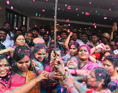 BRS MLC K Kavitha with party workers celebrates the introduction of Women's Reservation Bill, in Hyderabad, Tuesday, Sept. 19, 2023. (PTI)