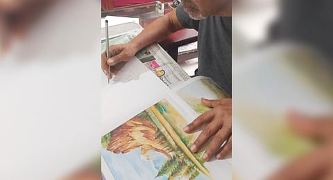 A client of Easedementia engaged in drawing