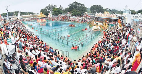 Chakrasnanam being performed at the Swami Pushkarini on Tuesday | Madhav K
