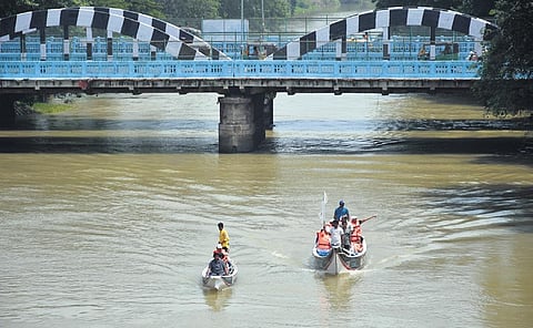 VMC officials seen inspecting the canal in Vijayawada I Prasant Madugula