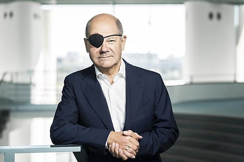 German Chancellor Olaf Scholz with a black eye-pad at the chancellery in Berlin (Photo | AP)