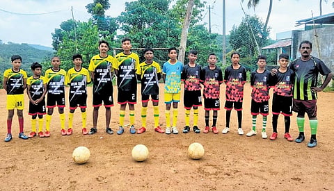 Jayson C Johan (extreme right) with students