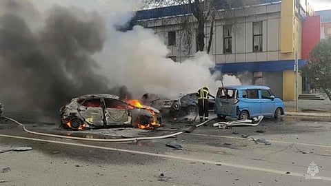 This photo taken from video released by the Russia Emergency Situations Ministry on December 30, shows firefighters extinguishing flames after shelling in Belgorod (Photo | AFP)