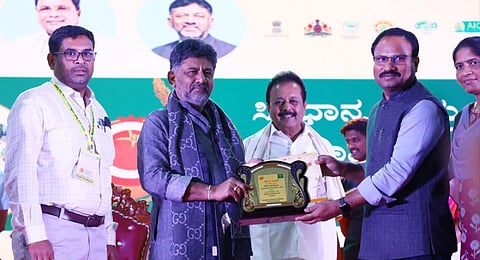 RySS Senior Thematic Lead Prabhakar receiving the award from Karnataka Deputy CM DK Shiva Kumar | Express