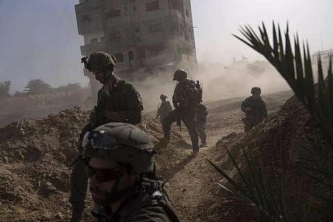 Israeli soldiers take up positions during a ground operation in Khan Younis, Gaza Strip on Wednesday, Jan. 10. 2024. (Photo | AP)