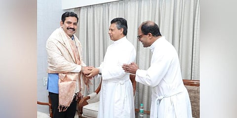 State BJP chief BY Vijayendra greets Dr Father CC Jose, Christ University, Vice-Chancellor, and Dr Father Varghese, finance officer, in Bengaluru on Thursday | Express