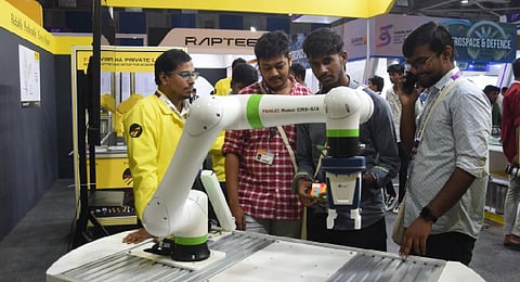 Visitors looking at tech innovations at the trade centre. (Photo | Ashwin Prasath, EPS)