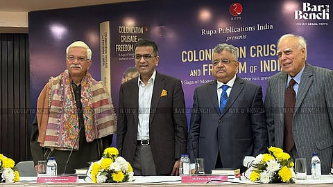 (L-) Rakesh Dwivedi, former CJI Chandrachud, SG Mehta and Senior Advocate Sibal at the book launch