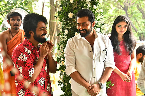 GV Prakash and Suriya in conversation at the pooja ceremony of Suriya 46