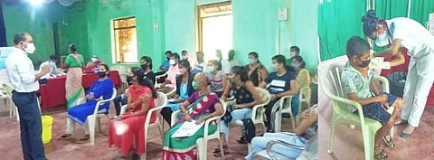 आगर वाडा चोपडे पंचायत येथे लसीकरण करताना