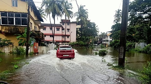 After heavy rains lashed Goa, Car finds the way through the water in the Area of Taleigao, on Friday, 15 july, 2021