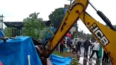 Shops demolishing by crane, at Mapusa (Goa) on Tuesday, 20 July, 2021.