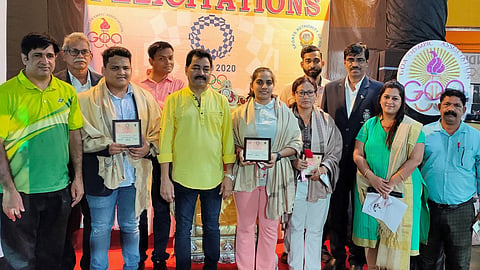 Olympics Awareness : Distinguished guests with archery honors.