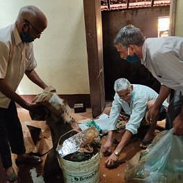 Goa: Shopkeepers removing damaged items in a market shop