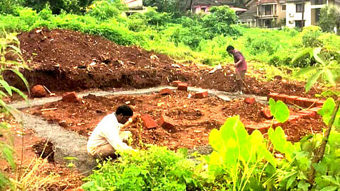 Workers constructing 'Artificial Lake' in Bicholin (Goa)
