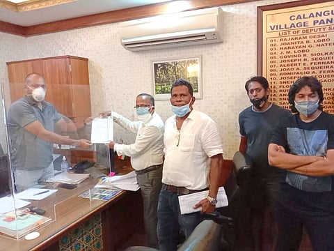 Calangute Forum President Premanand Diwakar and locals handing over a statement to Calangute Sarpanch, Calangute - Goa. on 10 August, 2021.