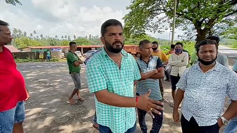 Local sand traders talking to reporters (Goa)