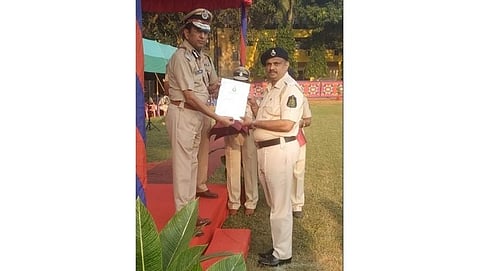 Ajit Parab receiving the award Police 