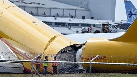 dhl cargo plane breaks in two during emergency landing costa rica