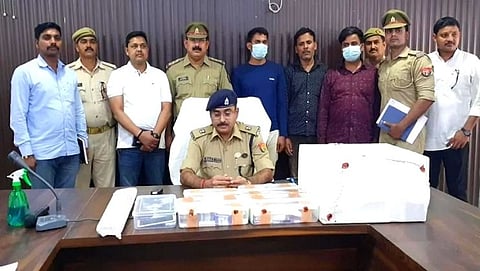 A gang carrying a counterfeit note machine has gone missing