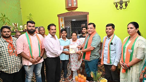 Minister Mauvin Godinho interacting with citizens at Curtorim