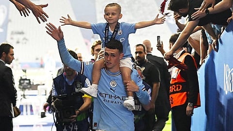 Phil Foden with Son Ronnie