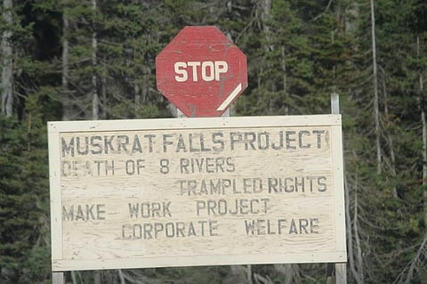 Protest sign at the Muskrat Falls site, June 12. Janet Cooper, Author provided