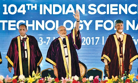 (From left)
Andhra Pradesh
and Telangana
governor E S L
Narasimhan,
Prime Minister
Narendra Modi
and Andhra
Pradesh Chief
Minister N
Chandrababu
Naidu at the
inauguration
of the 104th
Indian Science
Congress 2017 (Photo: PIB.NIC.IN)