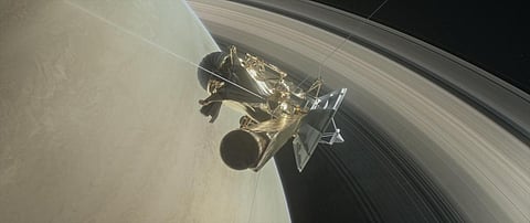 This illustration shows NASA's Cassini spacecraft about to make one of its dives between Saturn and its innermost rings as part of the mission's Grand Finale
Credit: NASA/JPL-Caltech