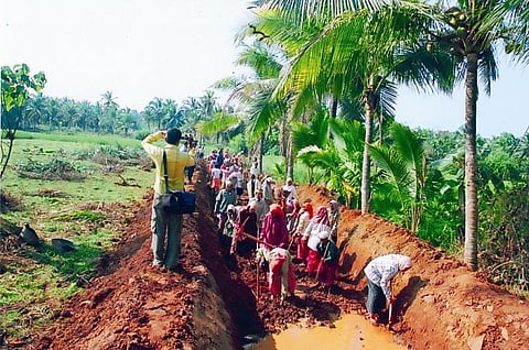 MGNREGA is an employment guarantee scheme and provides unskilled work for at least 100 days to rural families (Credit: Rajankila/Wikimedia Commons)