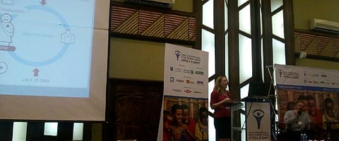 Karin Kallander, senior research advisor at the Malaria Consortium, explains upSCALE digital platform at the AIDF conference. Credit: Subhojit Goswami / DTE