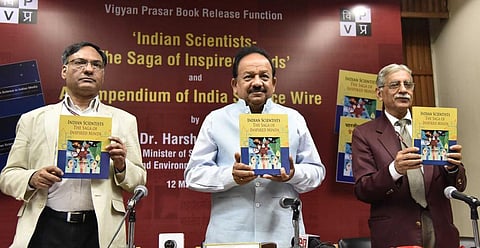 Prof. Ashutosh Sharma, Dr. Harshvardhan and Shri Chandermohan releasing the book. Credit: PIB