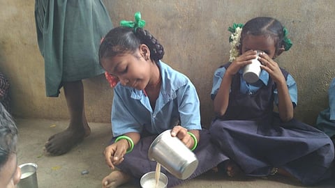 School children in Dalitwada drinking 'Jeevani milk' Credit: Aparna Krishnan