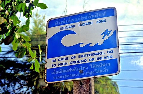 A Tsunami warning board in Thailand. Credit: Getty Images