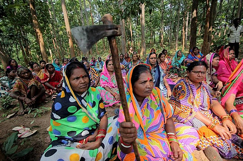 As many as 1,000 households of Balarampur stood their ground in the face of the administration aided by armed police force felling trees in Jhinkargadi forest. Credit: Jyoti Prakash Brahma