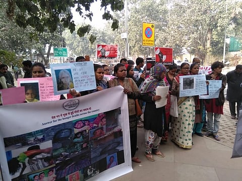 Right to food activists protest in New Delhi on December 17, 2018