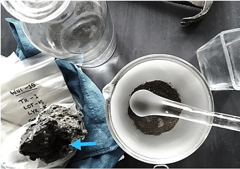 Preparing iron slag samples for studying its microstructures (Photo :Tiatemjen Tzudir)